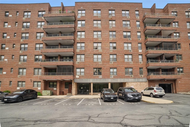 60 Barker St Unit 417, Mount Kisco, NY 10549 - view of apartment building / complex featuring uncovered parking