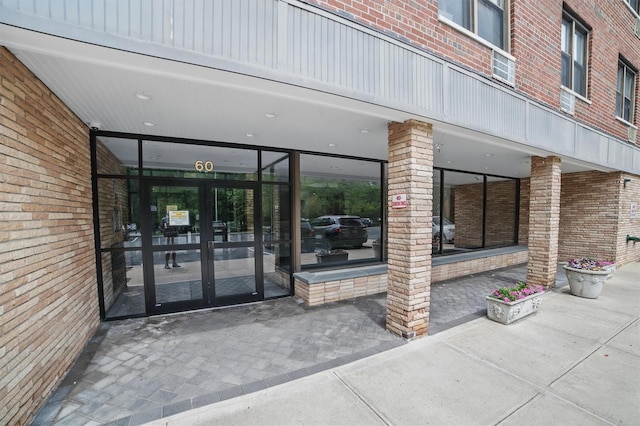 60 Barker St Unit 417, Mount Kisco, NY 10549 - doorway to property with french doors and brick siding