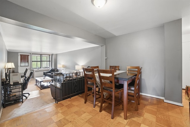 60 Barker St Unit 417, Mount Kisco, NY 10549 - dining space featuring a desk, baseboards, and radiator