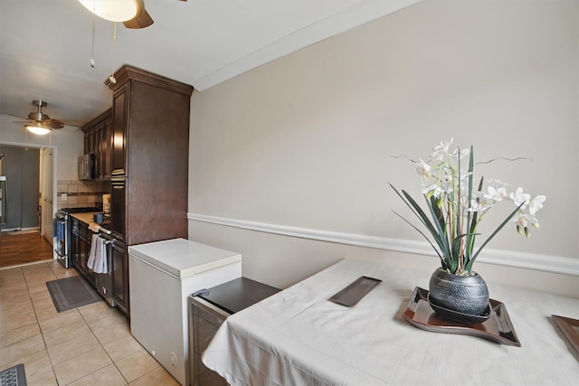 60 Barker St Unit 417, Mount Kisco, NY 10549 - dining room with a ceiling fan and light tile patterned flooring
