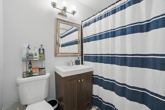 60 Barker St Unit 417, Mount Kisco, NY 10549 - full bathroom featuring toilet, vanity, and a shower with shower curtain