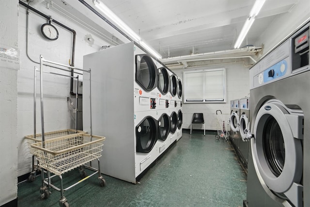 60 Barker St Unit 417, Mount Kisco, NY 10549 - communal laundry room featuring stacked washer / dryer and washing machine and clothes dryer