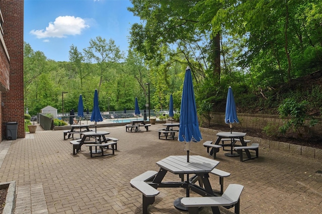 60 Barker St Unit 417, Mount Kisco, NY 10549 - view of home's community featuring a swimming pool and a patio area