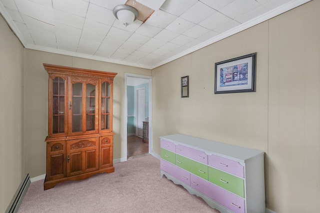 96 Toomey Rd, West Islip, NY 11795 - living area with a baseboard radiator, light carpet, ornamental molding, and baseboards