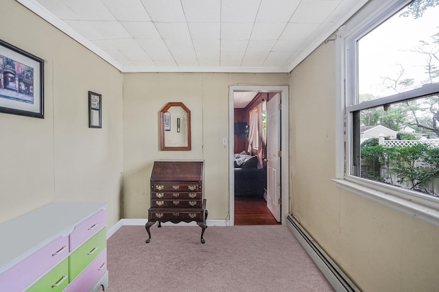96 Toomey Rd, West Islip, NY 11795 - living area with carpet, plenty of natural light, crown molding, and baseboard heating