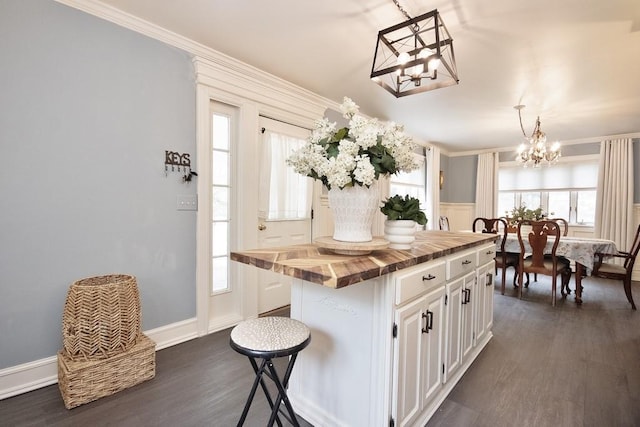 3454 State Route 208, Campbell Hall, NY 10916 - kitchen featuring butcher block countertops, a chandelier, dark wood-type flooring, white cabinetry, and plenty of natural light