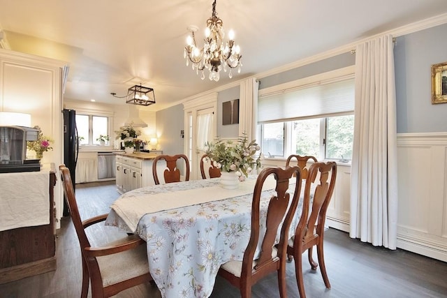 3454 State Route 208, Campbell Hall, NY 10916 - dining room with dark wood-style flooring, a chandelier, wainscoting, crown molding, and a decorative wall