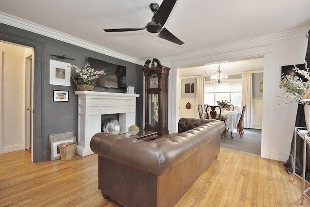 3454 State Route 208, Campbell Hall, NY 10916 - living area with a chandelier, light wood finished floors, ceiling fan, ornamental molding, and a fireplace