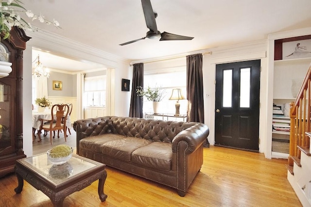 3454 State Route 208, Campbell Hall, NY 10916 - living area with stairway, crown molding, a chandelier, ceiling fan, and light wood-type flooring