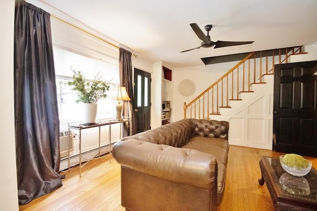 3454 State Route 208, Campbell Hall, NY 10916 - living area featuring stairway, ceiling fan, light wood-type flooring, and a baseboard heating unit