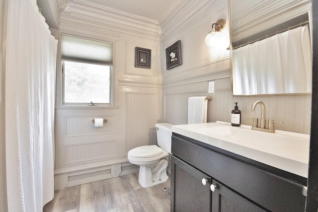 3454 State Route 208, Campbell Hall, NY 10916 - bathroom featuring vanity, toilet, crown molding, a decorative wall, and wood finished floors