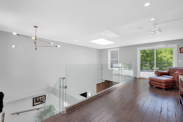 459 Vanderbilt Ave, Brooklyn, NY 11238 - living area featuring recessed lighting, a skylight, wood finished floors, and a chandelier