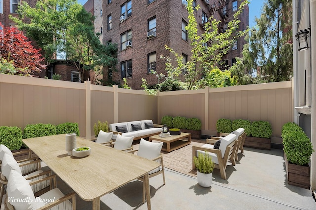 459 Vanderbilt Ave, Brooklyn, NY 11238 - fenced backyard featuring an outdoor hangout area and a patio area