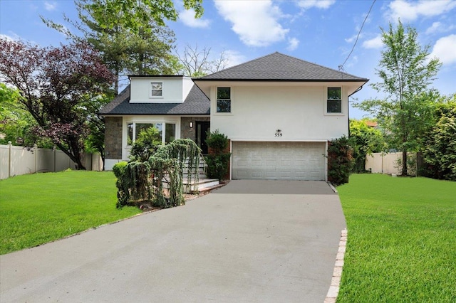 559 Linda Ln, Woodmere, NY 11598 - split level home featuring concrete driveway, an attached garage, stucco siding, and a shingled roof