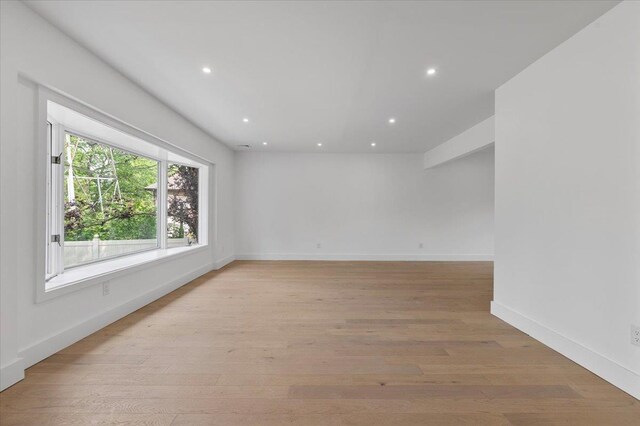 559 Linda Ln, Woodmere, NY 11598 - unfurnished room featuring recessed lighting, light wood-style floors, and baseboards