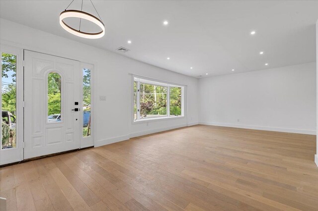 559 Linda Ln, Woodmere, NY 11598 - foyer entrance featuring light wood-type flooring, baseboards, and recessed lighting