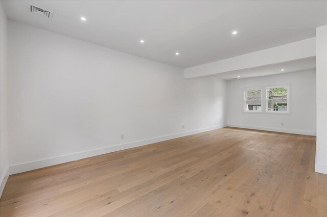 559 Linda Ln, Woodmere, NY 11598 - empty room featuring light wood-type flooring, recessed lighting, and baseboards