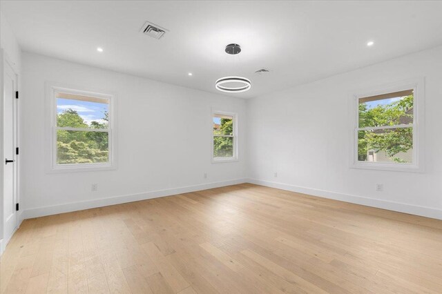 559 Linda Ln, Woodmere, NY 11598 - unfurnished room featuring light wood finished floors, baseboards, and recessed lighting