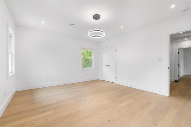 559 Linda Ln, Woodmere, NY 11598 - unfurnished room with light wood-type flooring, baseboards, and recessed lighting