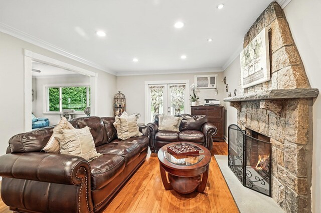 114 Longview Ave, White Plains, NY 10605 - living area with recessed lighting, healthy amount of natural light, wood finished floors, french doors, and a stone fireplace