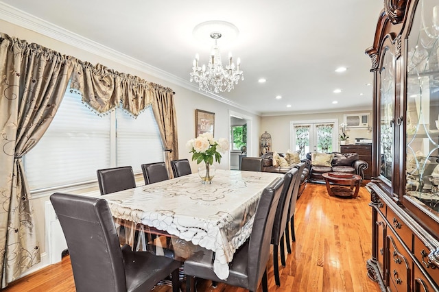 114 Longview Ave, White Plains, NY 10605 - dining area with crown molding, a chandelier, light wood-style floors, french doors, and recessed lighting