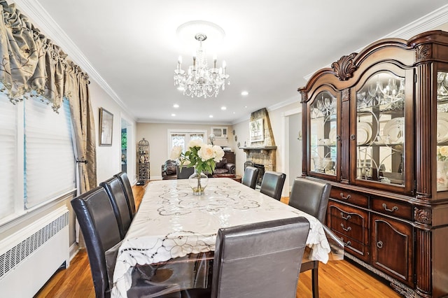 114 Longview Ave, White Plains, NY 10605 - dining room featuring radiator, a chandelier, recessed lighting, light wood-style flooring, and ornamental molding
