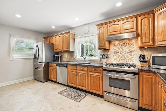 114 Longview Ave, White Plains, NY 10605 - kitchen featuring appliances with stainless steel finishes, a sink, extractor fan, recessed lighting, and baseboards