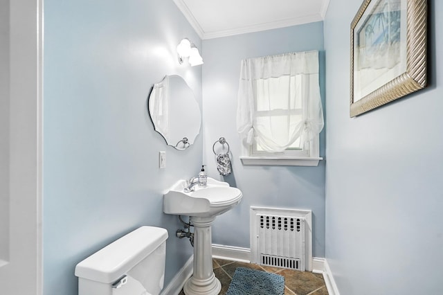 114 Longview Ave, White Plains, NY 10605 - bathroom with radiator heating unit, toilet, baseboards, crown molding, and tile patterned floors