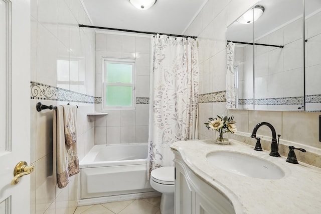 114 Longview Ave, White Plains, NY 10605 - full bathroom with tile walls, vanity, shower / bathtub combination with curtain, toilet, and tile patterned flooring