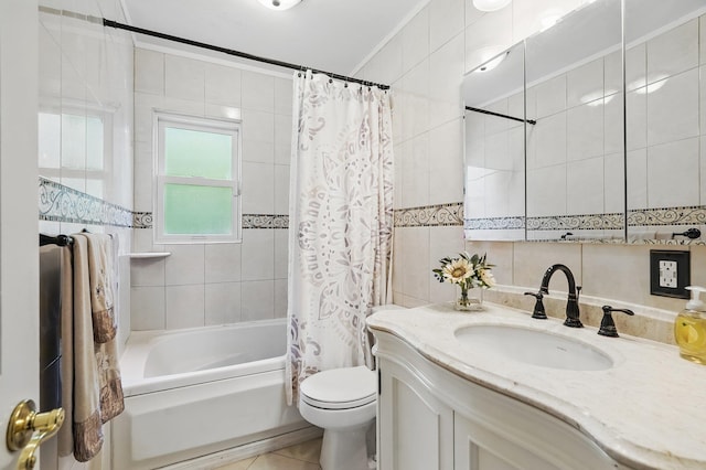 114 Longview Ave, White Plains, NY 10605 - bathroom featuring tile walls, vanity, shower / bath combo, toilet, and tile patterned flooring