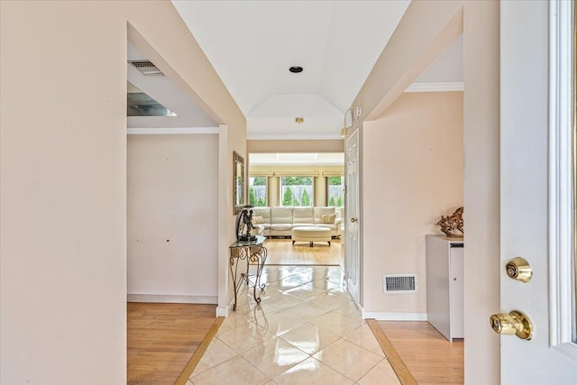 48 Fairfield Dr, Dix Hills, NY 11746 - corridor featuring inlaid floor details, baseboards, light tile patterned floors, and ornamental molding