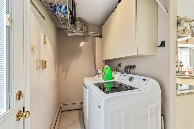 48 Fairfield Dr, Dix Hills, NY 11746 - laundry room with washer and clothes dryer, light tile patterned floors, cabinet space, baseboard heating, and baseboards