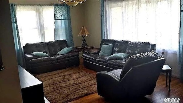 569 Peninsula Blvd, Cedarhurst, NY 11516 - living area with wood finished floors