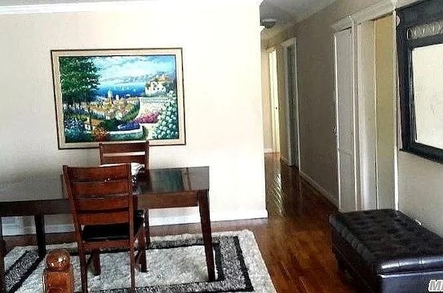 569 Peninsula Blvd, Cedarhurst, NY 11516 - dining space with wood finished floors and baseboards