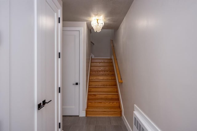 15 Old Nyack Tpke Unit 201, Monsey, NY 10952 - staircase with baseboards and a chandelier