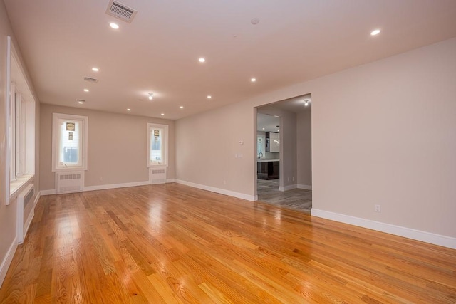 15 Old Nyack Tpke Unit 201, Monsey, NY 10952 - unfurnished room featuring light wood finished floors, recessed lighting, radiator, and baseboards
