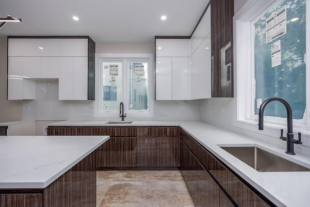 15 Old Nyack Tpke Unit 201, Monsey, NY 10952 - kitchen with modern cabinets, a sink, white cabinets, and recessed lighting
