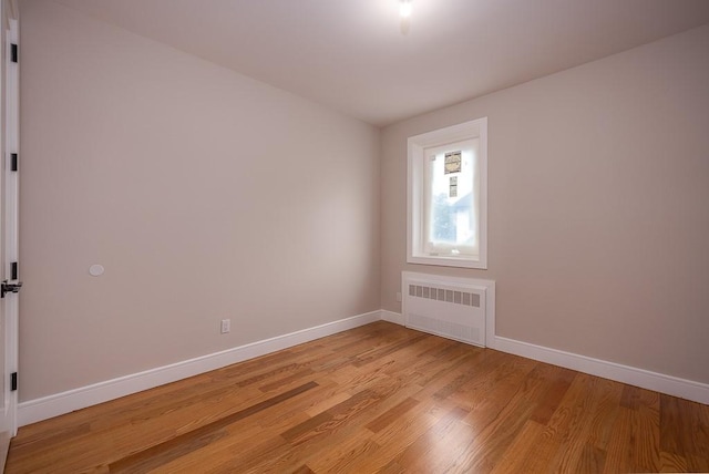 15 Old Nyack Tpke Unit 201, Monsey, NY 10952 - spare room with radiator, baseboards, and light wood-type flooring
