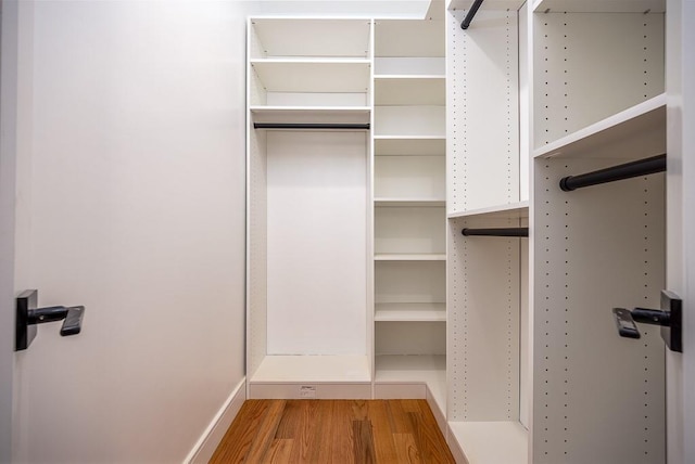 15 Old Nyack Tpke Unit 201, Monsey, NY 10952 - walk in closet featuring wood finished floors