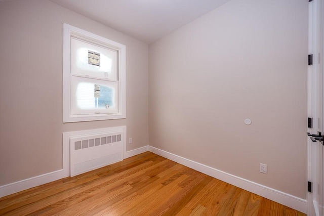 15 Old Nyack Tpke Unit 201, Monsey, NY 10952 - spare room with radiator, baseboards, and light wood-type flooring