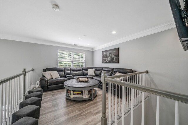 4 Cari Ln, Middle Island, NY 11953 - living room featuring crown molding, wood finished floors, and recessed lighting