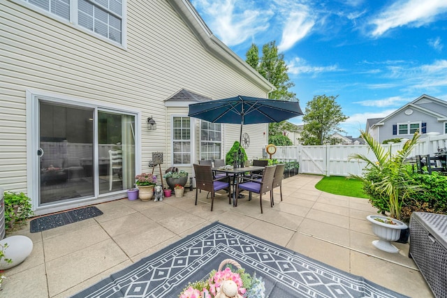 4 Cari Ln, Middle Island, NY 11953 - view of patio / terrace with a gate and outdoor dining space