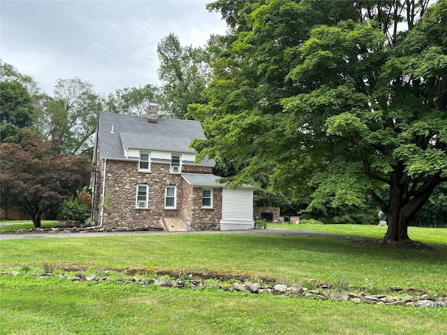 147 Lime Ridge Rd, Poughquag, NY 12570 - view of front of home with stone siding, a front lawn, and a chimney