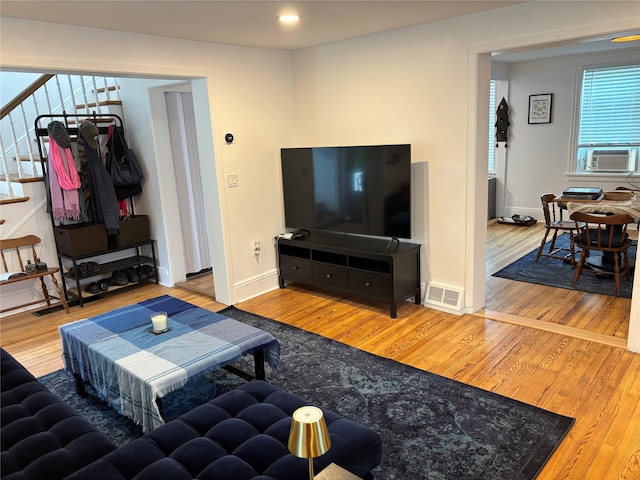 147 Lime Ridge Rd, Poughquag, NY 12570 - living area with stairway, wood finished floors, and cooling unit