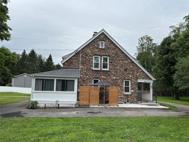 147 Lime Ridge Rd, Poughquag, NY 12570 - rear view of house with stone siding and a shingled roof