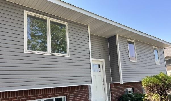23 Tower St, Huntington Station, NY 11746 - view of property exterior with brick siding