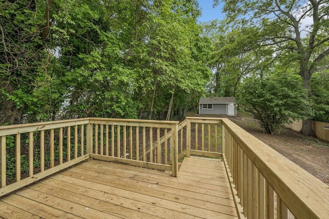 23 Tower St, Huntington Station, NY 11746 - deck featuring an outdoor structure and view of scattered trees