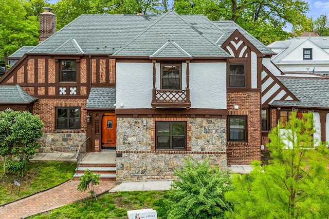 164-03 33rd Ave, Flushing, NY 11358 - tudor house featuring a chimney, stone siding, and stucco siding
