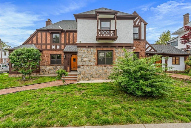 164-03 33rd Ave, Flushing, NY 11358 - tudor house with a front lawn, a chimney, stone siding, and stucco siding