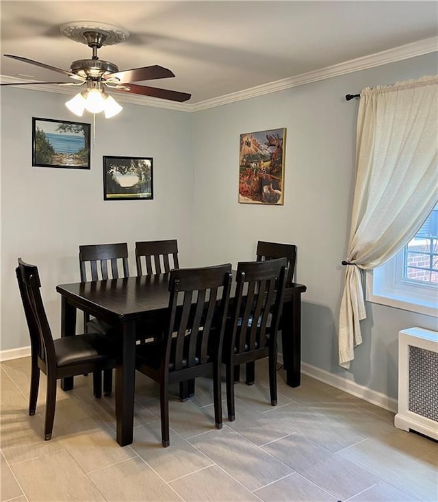 330 S Broadway Unit E2, Tarrytown, NY 10591 - dining room featuring ceiling fan, crown molding, baseboards, and light tile patterned floors